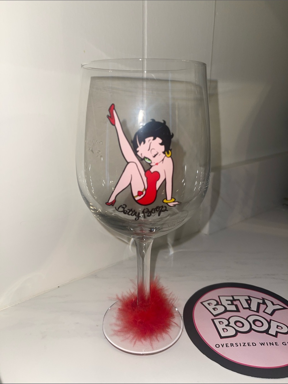 Betty Boop Clear Wine Glass with Red Artwork and Red Feather Base